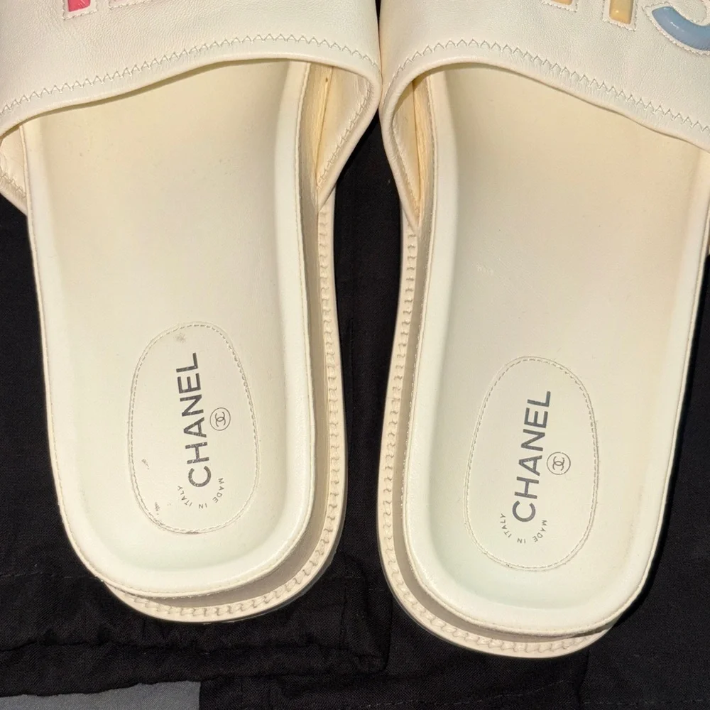 CHANEL White Leather Slide Sandals with Pastel Lettering